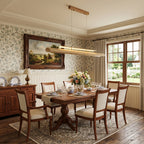 Sora Linear Chandelier in natural wood finish.