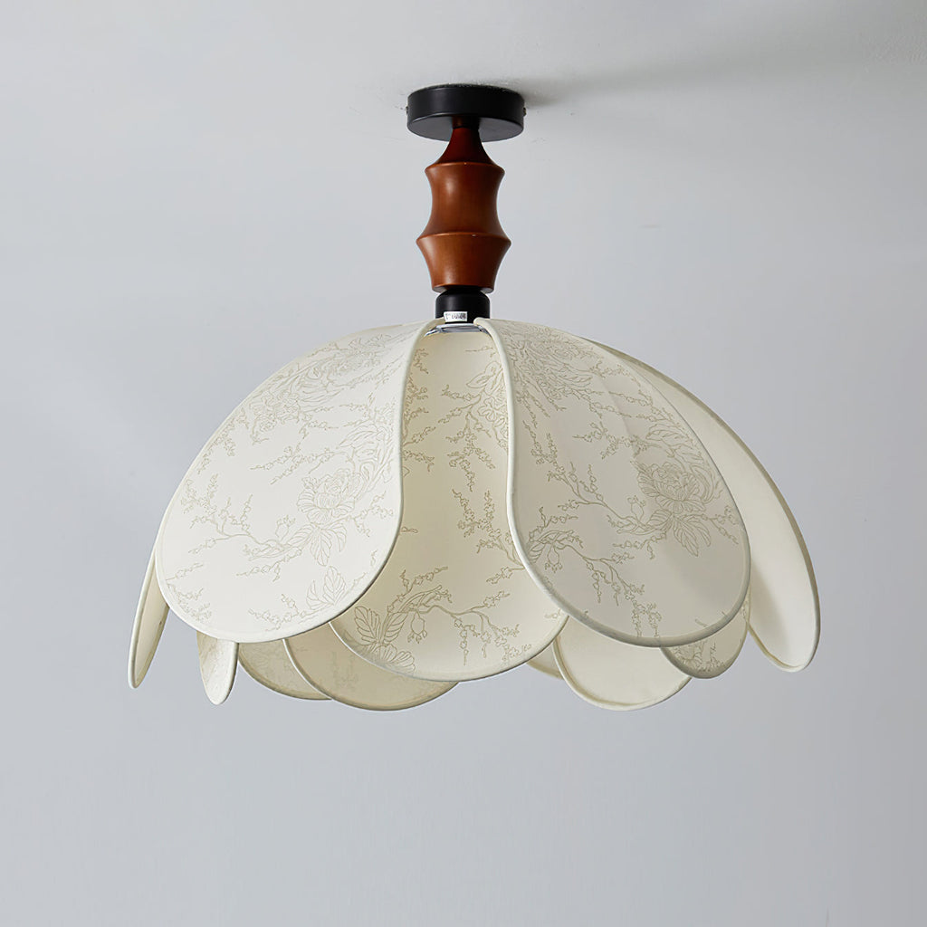 The Savoy Ceiling Light illuminated in a contemporary living room.