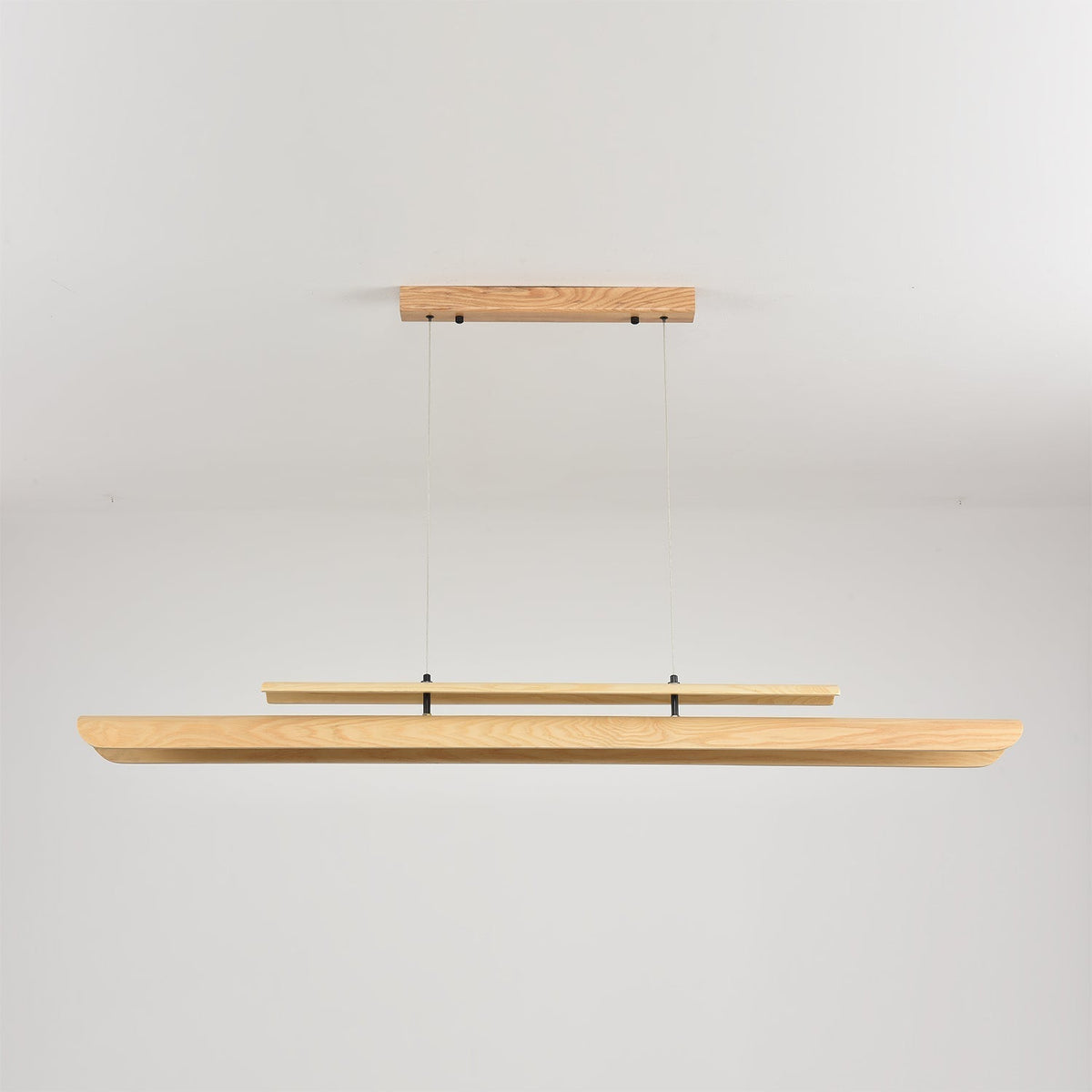 The 120cm version of the chandelier in a compact dining space.